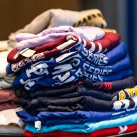 T-shirts folded in a pile